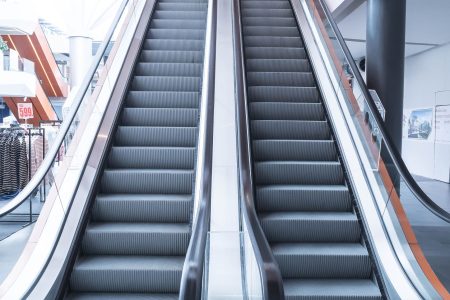 escalator,Up and down escalators in public building.